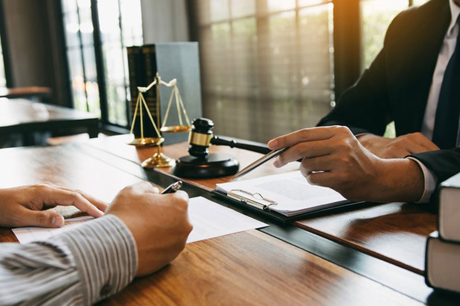 Lawyers reviewing documents together at a table